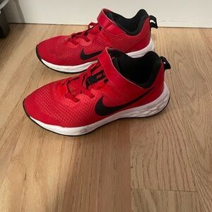 Boys size 1 Nike sneakers red and black